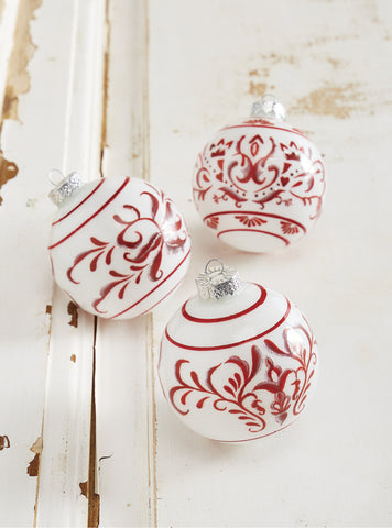 RAZ IMPORTS 4" RED AND WHITE SCROLL GLASS BALL ORNAMENT